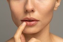 64259-gallery-woman-applying-moisturizing-nourishing-balm-to-her-2023-11-27-05-14-25-utc.jpg